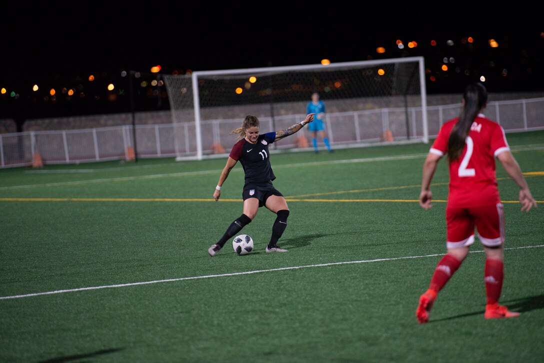 FORT BLISS, Texas. –  Air Force Capt. Krystin Cooper winds up to kick as the USA team battled Canada June 26 at the 2018 Conseil International du Sport Militaire (CISM) World Military Women’s Football Championship at Fort Bliss’ Stout Field. Cooper also scored the lone goal of the match on a penalty kick in the 51st minute to earn her team’s first win of the tournament. International military teams squared off over 12 days to eventually crown the best women soccer players among the international militaries participating. U.S. Navy photo by Mass Communication Specialist 3rd Class Camille Miller (Released)