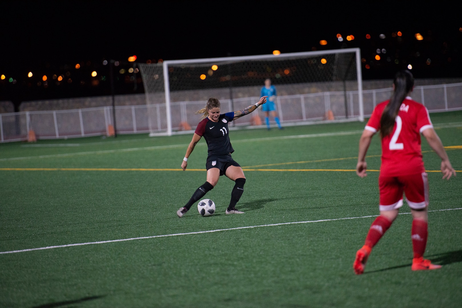 FORT BLISS, Texas. –  Air Force Capt. Krystin Cooper winds up to kick as the USA team battled Canada June 26 at the 2018 Conseil International du Sport Militaire (CISM) World Military Women’s Football Championship at Fort Bliss’ Stout Field. Cooper also scored the lone goal of the match on a penalty kick in the 51st minute to earn her team’s first win of the tournament. International military teams squared off over 12 days to eventually crown the best women soccer players among the international militaries participating. U.S. Navy photo by Mass Communication Specialist 3rd Class Camille Miller (Released)