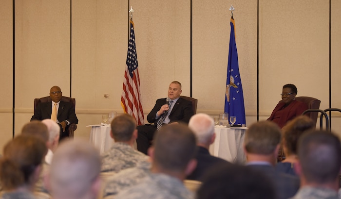 From left to right, retired Gen. Larry Spencer, Air Force Association president and former vice chief of staff of the Air Force, retired Chief Master Sgt. of the Air Force James Roy, and retired Chief Master Sgt. Jan Adams, speak to members of the base during an Air Force Association professional development event on Joint Base Charleston, S.C., June 26, 2018. , the Air Force Association organized “Airmen for Life,” a professional development event designed to bring all Airmen – officer, enlisted and civilian – together to listen to, learn from and speak to three influential panel leaders.