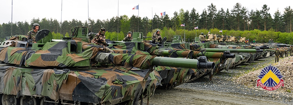 Tanks from six NATO and nations wait for their turn to fire at targets during the Strong Europe Tank Challenge (SETC), at the 7th Army Training Command's Grafenwoehr Training Area, Germany, May 12, 2017