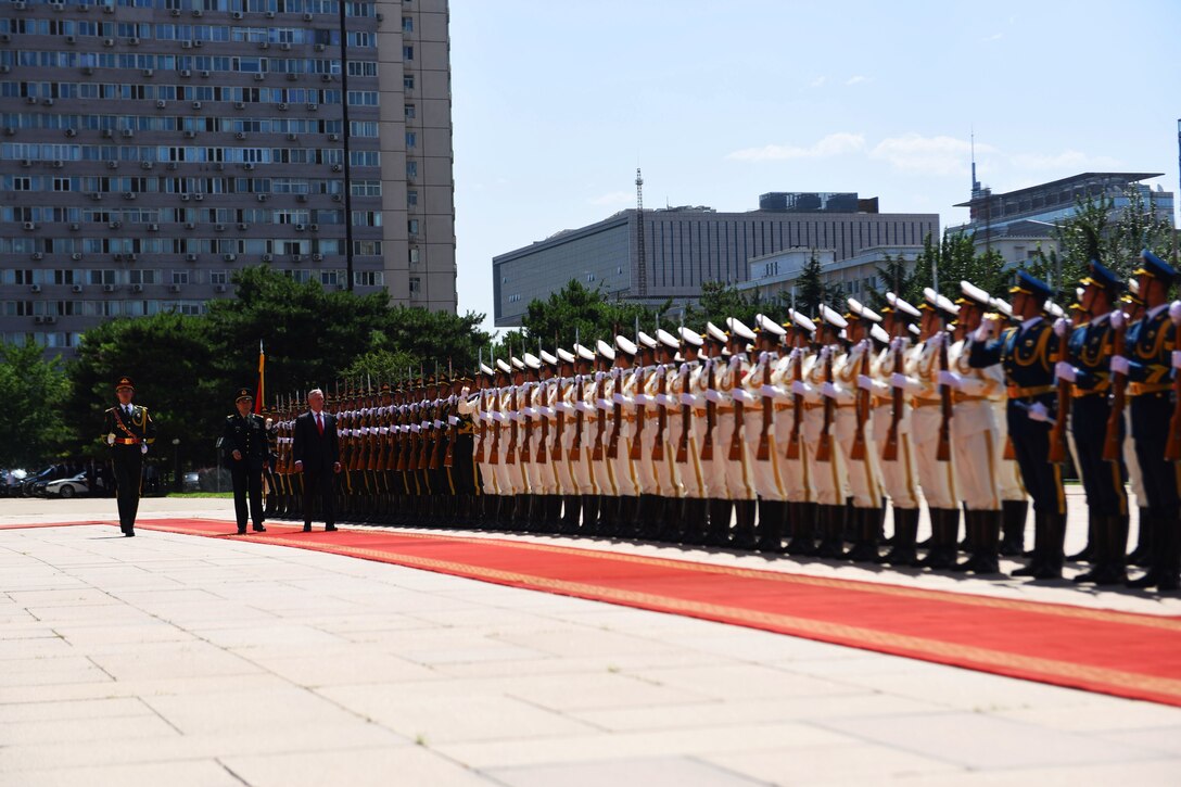 Defense Secretary James N. Mattis and China’s Minister of National Defense Wei Fenghe perform a pass and review of the soldiers.