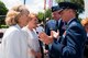 Denise Halvorsen-Williams, left, and Marilyn Halvorsen-Sorenson, daughters of Ret. Col. Gail S. Halvorsen, known as the Candy Bomber, speak with U.S. Air Force Col. Tad D. Clark, 52nd Fighter Wing vice commander, and U.S. Air Force Lt. Col. Shannon Caleb, commander of the 726th Air Mobility Squadron, both from Spangdahlem Air Base, at the Berlin Airlift 70th anniversary commemoration at Frankfurt International Airport, Germany, June 26, 2018. The Candy Bomber played a major role during the historic event by dropping 23 tons of candy to children. (U.S. Air Force photo by Airman 1st Class Valerie Seelye)