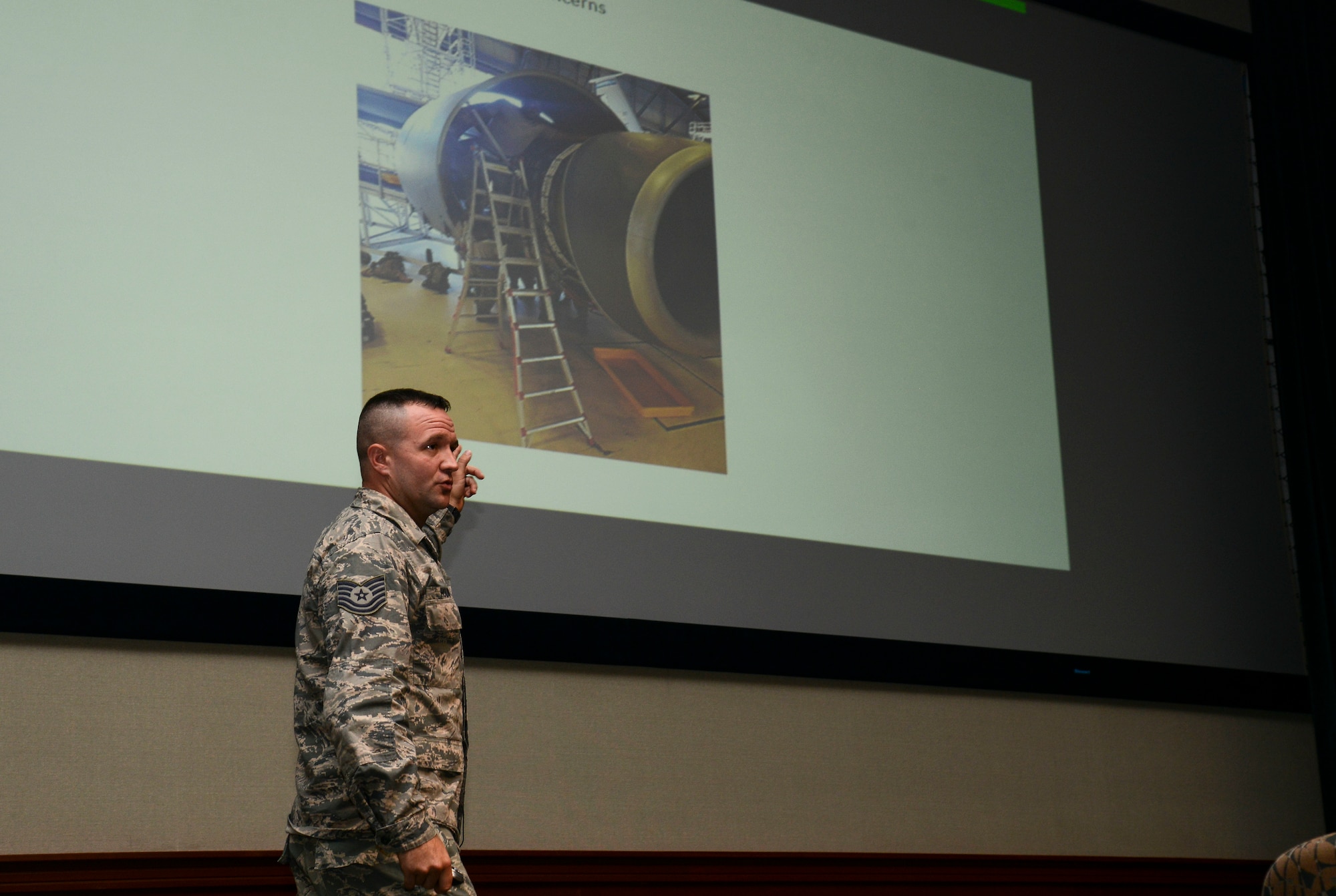 U.S. Air Force Tech. Sgt. Eric Holston, support section NCO in charge assigned to the 6th Maintenance Squadron, presents his idea for an F-108 engine maintenance stand during Fuel Tank at MacDill Air Force Base, Fla., June 27, 2018.