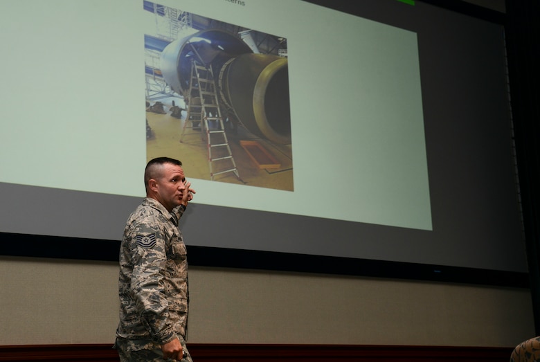 U.S. Air Force Tech. Sgt. Eric Holston, support section NCO in charge assigned to the 6th Maintenance Squadron, presents his idea for an F-108 engine maintenance stand during Fuel Tank at MacDill Air Force Base, Fla., June 27, 2018.