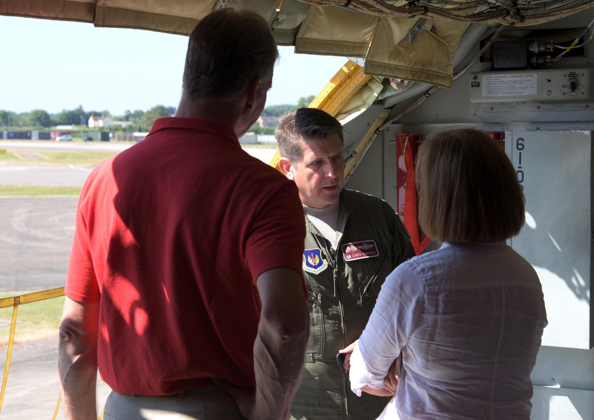 U.S. Air Force Col. Christopher Amrhein, 100th Air Refueling Wing commander, speaks with honorary commanders inside a U.S. Air Force KC-135 Stratotanker during Honorary Commanders Day at RAF Mildenhall, England, June 26, 2018. Honorary commanders support RAF Mildenhall Airmen by sharing their professional knowledge and personal experiences, as well as participating in squadron and wing events. (U.S. Air Force photo by Airman 1st Class Benjamin Cooper)