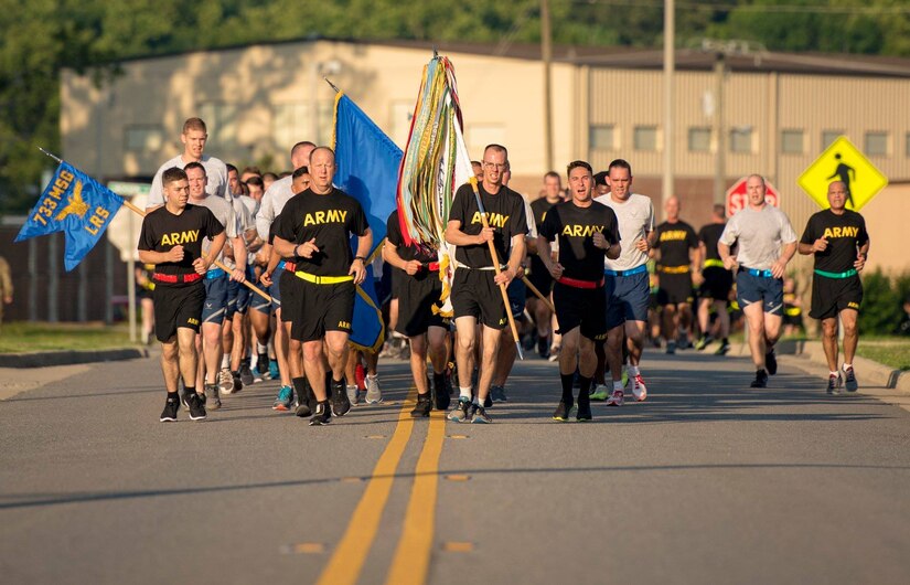 U.S. Army Col. Ralph L. Clayton, 733rd Mission Support Group commander, front-left, and Command Sgt. Maj. Eric J. Vidal, 733rd Mission Support Group command sergeant major, far-right, lead service members during the Army 243rd Birthday Run Celebration at Joint Base Langley-Eustis, Virginia, June 14, 2018.