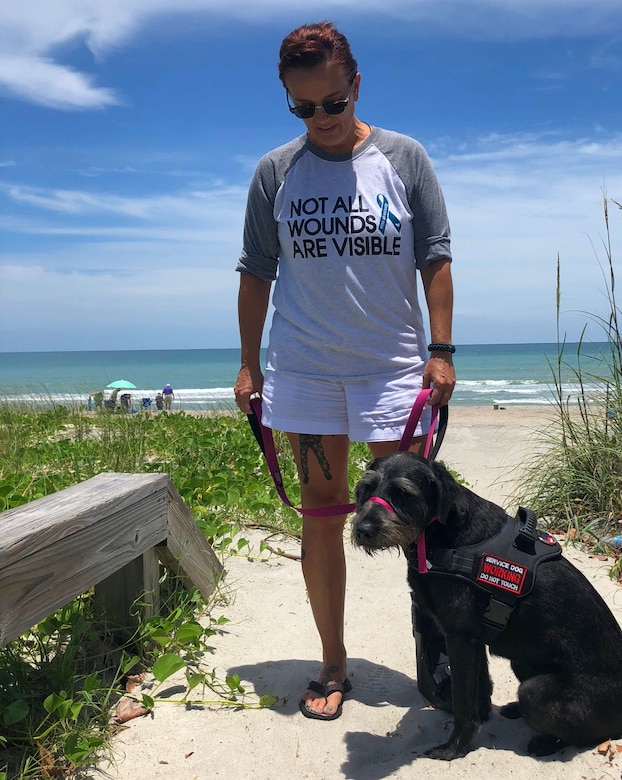 Air Force veteran Stacey Pavenski, 46, of Palm Bay, Florida, is on a journey to bring awareness to PTSD and traumatic brain injury disorders that lead 22 veterans a day to take their own lives. Her husband Air Force Master Sgt. Pete Pavenski took his own life Sept. 18, 2018. Joining forces with various organizations that provide assistance, Stacey is sharing her story during PTSD Awareness Month and getting the resources out there. (U.S. Air Force photo by Maj. Cathleen Snow)