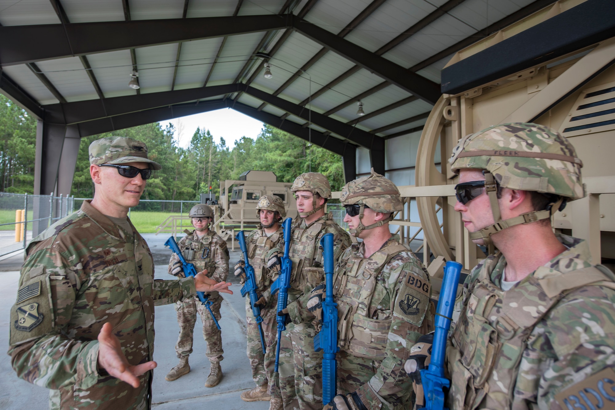 Col. Paul Birch, 93d Air Ground Operations Wing (AGOW) commander, speaks to Airmen from the 820th Base Defense Group (BDG) during an immersion tour, June 25, 2018, at Moody Air Force Base, Ga. Birch toured the BDG to gain a better understanding of their overall mission, duties and comprehensive capabilities. Prior to taking command of the 93d AGOW, Birch was the commander of the 380th Expeditionary Operations Group at Al Dhafra Air Base, United Arab Emirates. (U.S. Air Force photo by Airman 1st Class Eugene Oliver)