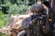 An Airman from the 820th Base Defense Group (BDG), prepares to enter a building during an immersion tour, June 25, 2018, at Moody Air Force Base, Ga. Col. Paul Birch, 93d Air Ground Operations Wing (AGOW) commander, toured the BDG to gain a better understanding of their overall mission, duties and comprehensive capabilities. Prior to taking command of the 93d AGOW, Birch was the commander of the 380th Expeditionary Operations Group at Al Dhafra Air Base, United Arab Emirates. (U.S. Air Force photo by Airman 1st Class Eugene Oliver)