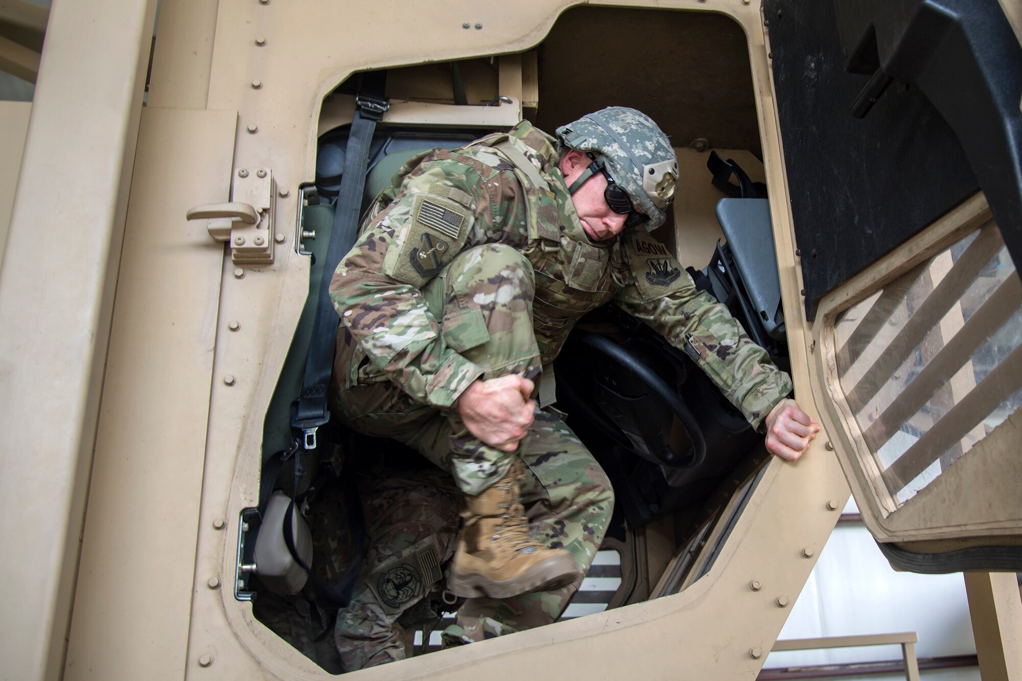 Col. Paul Birch, 93d Air Ground Operations Wing (AGOW) commander, steps out of a mine-resistant, ambush-protected vehicle roll-over simulator during an immersion tour, June 25, 2018, at Moody Air Force Base, Ga. Birch toured the 820th Base Defense Group to gain a better understanding of their overall mission, duties and comprehensive capabilities. Prior to taking command of the 93d AGOW, Birch was the commander of the 380th Expeditionary Operations Group at Al Dhafra Air Base, United Arab Emirates. (U.S. Air Force photo by Airman 1st Class Eugene Oliver)