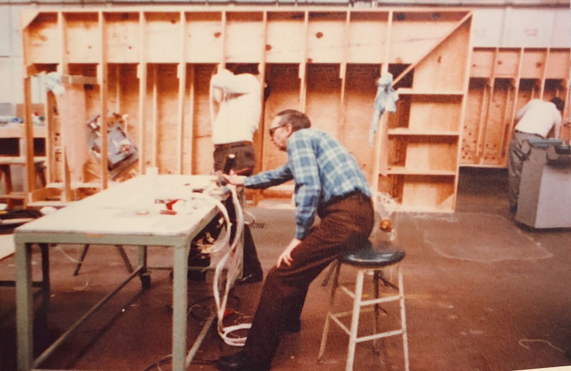 A photo of the individuals behind the building of Flamoke Air Force Base model built in 1979, at Chanute Air Force Base, Illinois. The model was moved to Goodfellow Air Force Base in 1993, when the fire school training was relocated to Goodfellow and renamed Norma Brown Air Force Base. (Courtesy Photo)