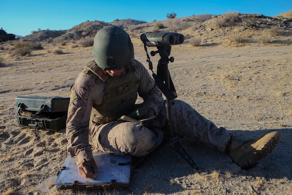 Cpl. Jan Eric Schaeuble, a rifleman and forward observer with Fox Company, 4th Light Armored Reconnaissance Battalion, 4th Marine Division, uses a vector kit to determine range and direction to a target and plots it on his map during the Air Assault Course at Integrated Training Exercise 4-18 at Marine Corps Air Ground Combat Center Twentynine Palms, California, on June 22, 2018. Integrated Training Exercise is a capstone exercise that enables Marines to maintain the highest levels of proficiency and readiness for worldwide deployment and the ability to work as a MAGTF. (United States Marine Corps photo by Cpl. Alexis B. Rocha/released)