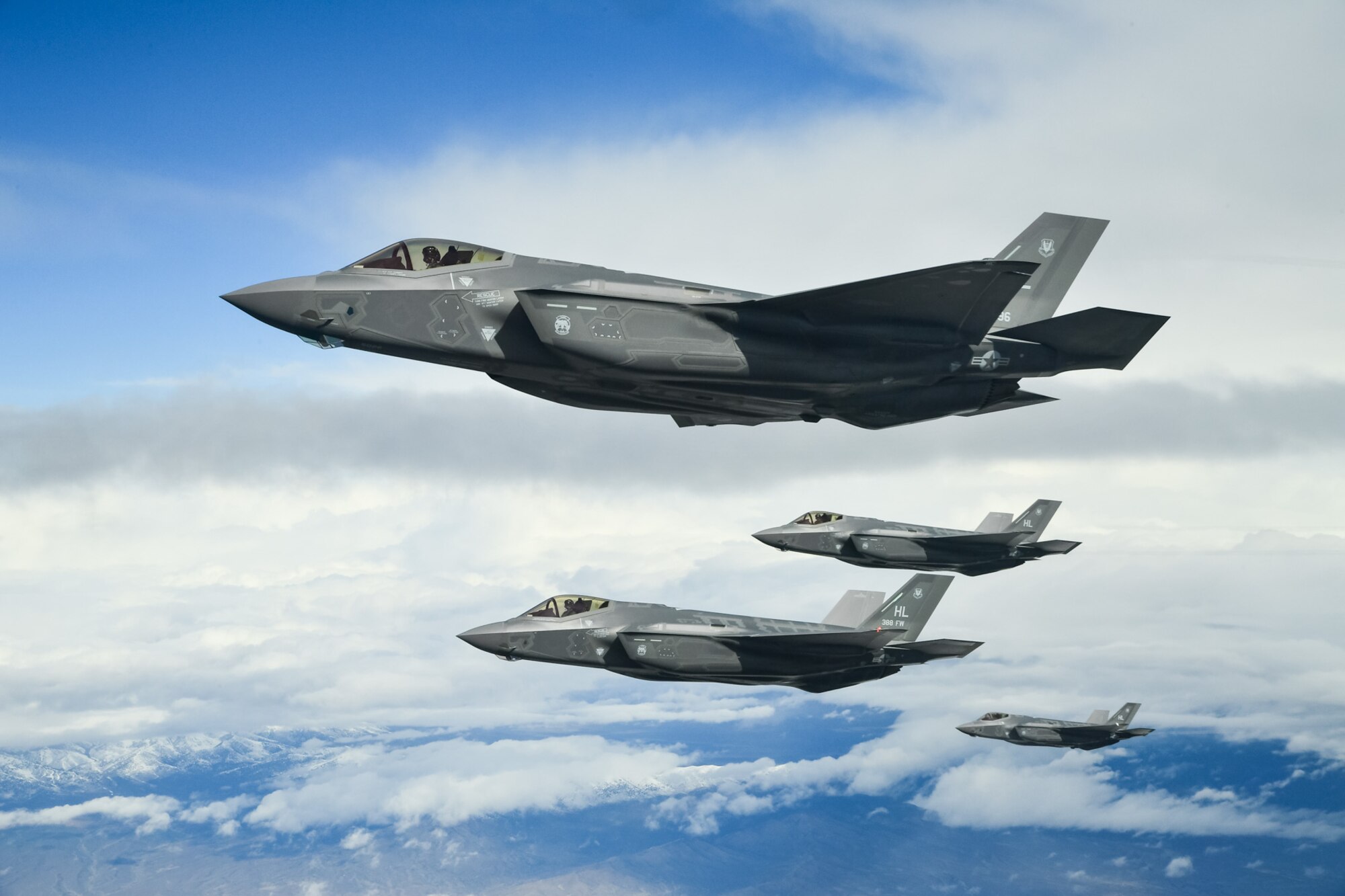 Four F-35 Lightning IIs fly in formation