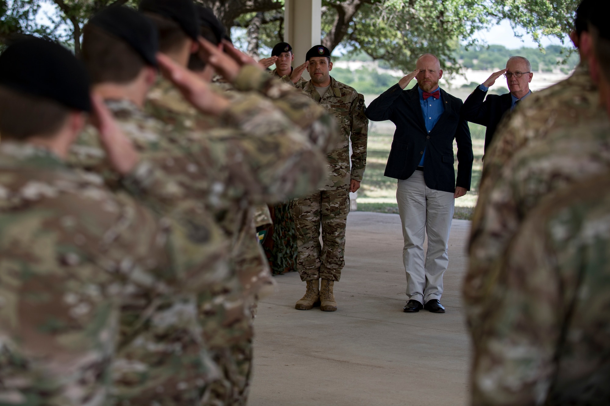 Past and present 11th Air Support Operations Squadron (ASOS) commanders salute a formation of 11th ASOS Airmen during a squadron inactivation ceremony, June 21, 2018, at Fort Hood, Texas. As a part of the 93d Air Ground Operations Wing from Moody Air Force Base, Ga., the 11th ASOS ‘Steel Eagles’ mission will remain unchanged as they continue to support Ft. Hood and absorb into the 9th ASOS. The enhanced 9th ASOS will continue to provide tactical air support to align with any U.S. Army unit that needs air support for their scheme of maneuver. (U.S. Air Force photo by Senior Airman Daniel Snider)