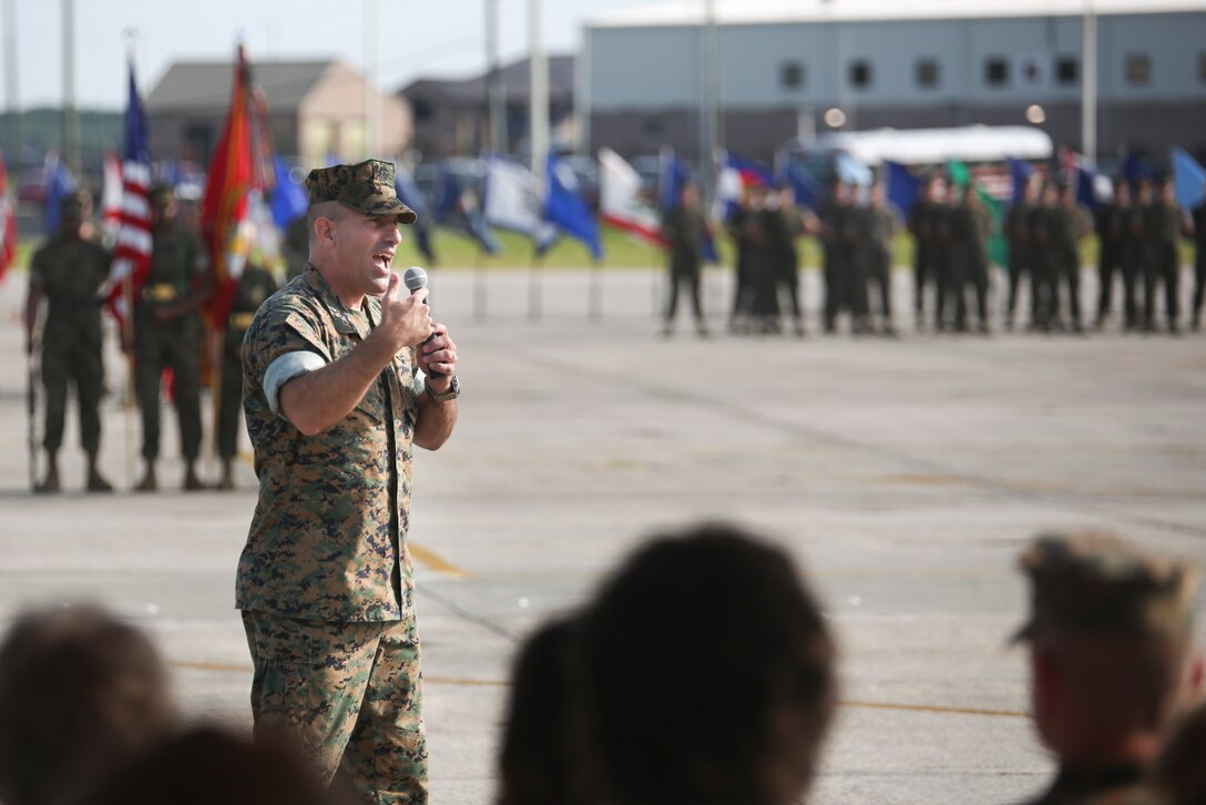 Col. Frank Latt addresses the crowd during a change of command ceremony aboard Marine Corps Air Station Beaufort June 25. Lt. Col. Adam L. Jeppe relinquished command of Marine Aviation Logistics Squadron 31 to Lt. Col. Anthony C. Lyons. Latt is the commanding officer of Marine Aircraft Group 31.