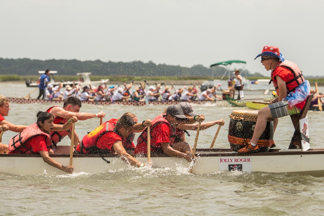 The Single Marine Program rowing team competes during the 6th annual DragonBoat Beaufort charity race June 23 at Waterfront Park in downtown Beaufort. The team was comprised of Marines and Sailors from the Tri-command. This was the second year SMP put together a team for the event. Both local and traveling teams competed in the volunteer organized event that strives to create a strong sense of wellness through competition, camaraderie and also raises money for local cancer patients, survivors, and families. The SMP team received the fastest local time for the second year in a row.