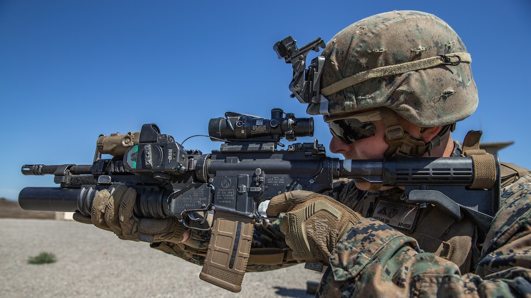 Lance Cpl. Andrew Parish, an infantry rifleman with 1st Light Armored Reconnaissance Battalion, 1st Marine Division, competes during the Rifle Squad Competition on Marine Corps Base Camp Pendleton, Calif., June 27, 2018. The units competed against each other to determine which squad will participate in the 1st MARDIV Infantry Competition in late August 2018.