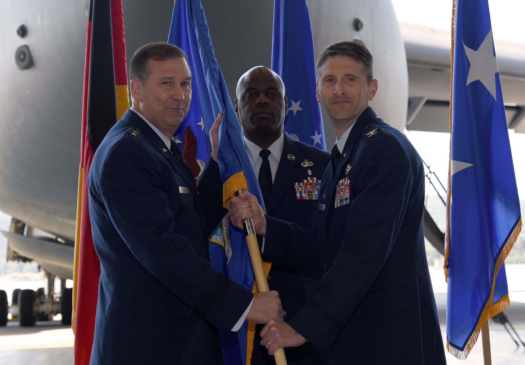 Col. Bradley L. Spears assumed command of the 521st Air Mobility Operation Wing during a change of command ceremony at Ramstein Air Base, Germany, June 28. Maj. Gen. Christopher Bence, U.S. Air Force Expeditionary Center commander, presided over the ceremony in which Col. Cooper relinquished command of the 521st AMOW to Spears.