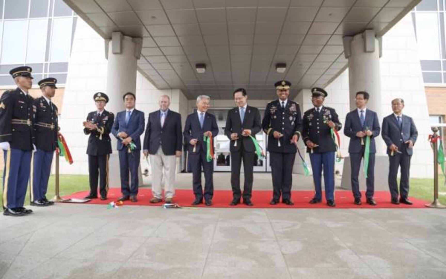 UNC/USFK Commander General Vincent K. Brooks cuts the ribbon to officially open the Vessey Complex, the new headquarters for United Nations Command and U.S. Forces Korea.