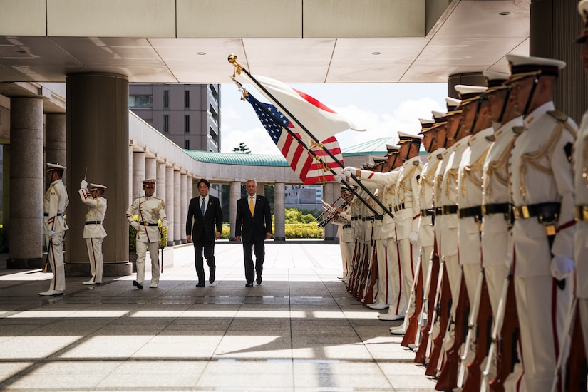 Defense Secretary James N. Mattis walks with Japanese Defense Minister Itsunori Onodera in Tokyo.