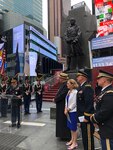 New York Army National Guard Chaplain (Lt. Col.) Scott Ehler, left, introduces the official party to commemorate the life and career of New York Army National Guard Chaplain Father Francis P. Duffy at Times Square June 27, 2018.  Ehler joined with Archbishop of New York Cardinal Timothy Dolan, WWI National Commissioner Dr. Libby O’Connell and the National Guard’s senior chaplain, Chaplain (Brig. Gen.) Kenneth “Ed” Brandt to commemorate Duffy’s service in WWI.