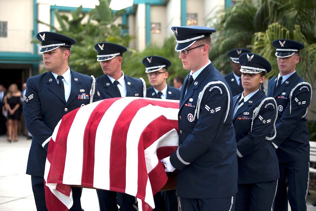 MacDill Air Force Base Honor Guard carries the casket of Col. Peter Stewart, an F-4C Phantom II aircraft pilot during the Vietnam War, during a military honors service at St. Matthew’s Catholic Church in Winter Haven, Fla., June 18, 2018. (U.S. Air Force photo by Airman 1st Class Ashley Perdue)