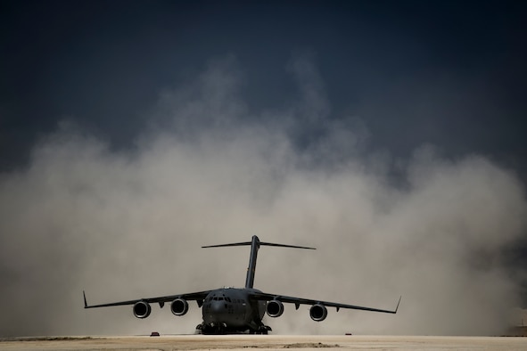 A C-17 Globemaster III readies for departure from an undisclosed location, June 23, 2018. C-17s can airdrop both cargo and personnel, and are able to land on small, austere runways as short as 3,000 feet with a full load. (U.S. Air Force Photo by Staff Sgt. Corey Hook)
