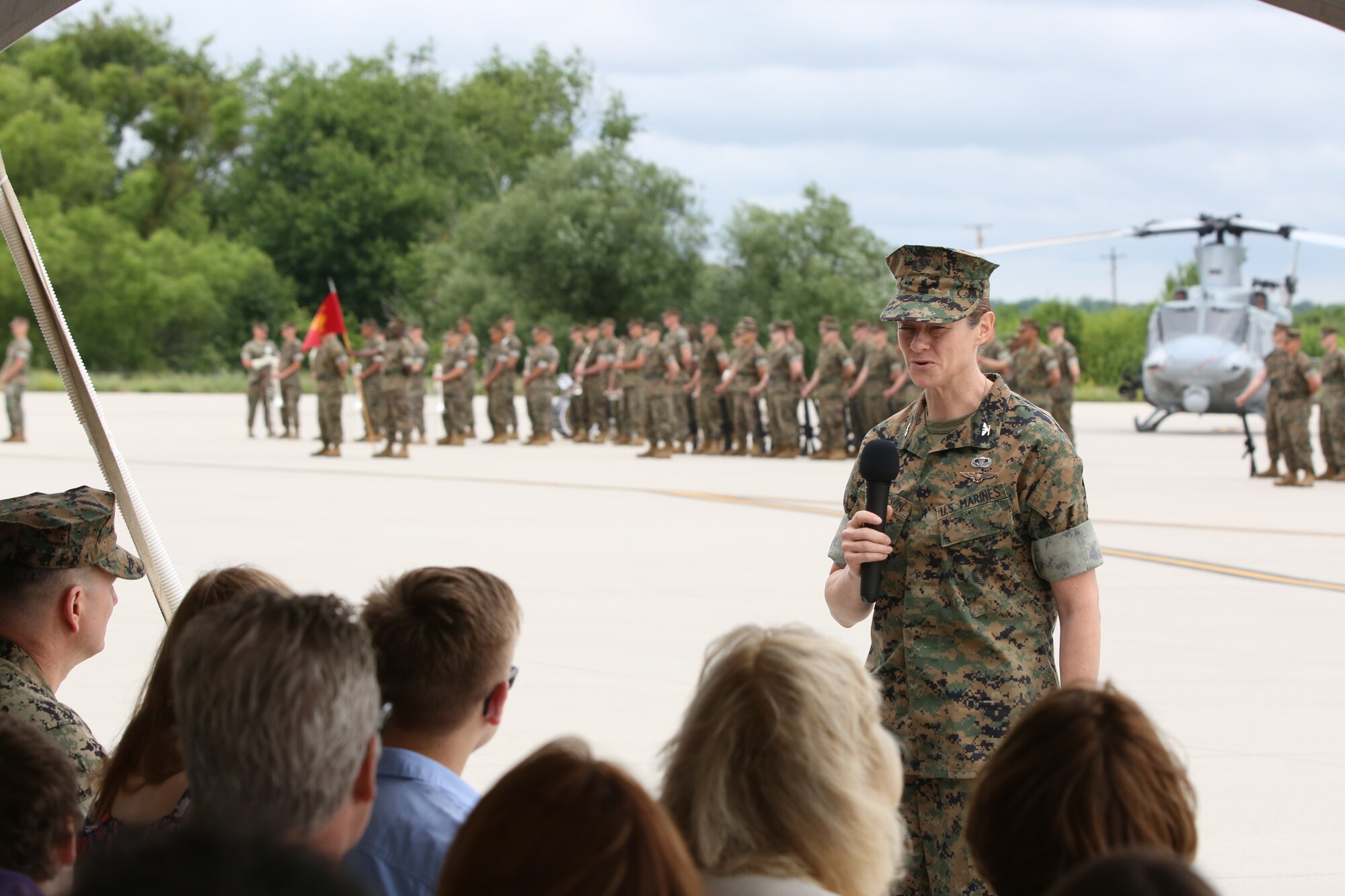 U.S. Marine Corps Col. Alison Thompson, Marine Aircraft Group 49 commander, speaks to those in attendance during the MAG-49 change of command ceremony on Joint Base McGuire-Dix-Lakehurst, N.J., June 22, 2018. During the ceremony, Marine Col. Robert Braatz relinquished command of the MAG-49 to Thompson. (U.S. Marine Corps photo by Cpl. David Torres.)