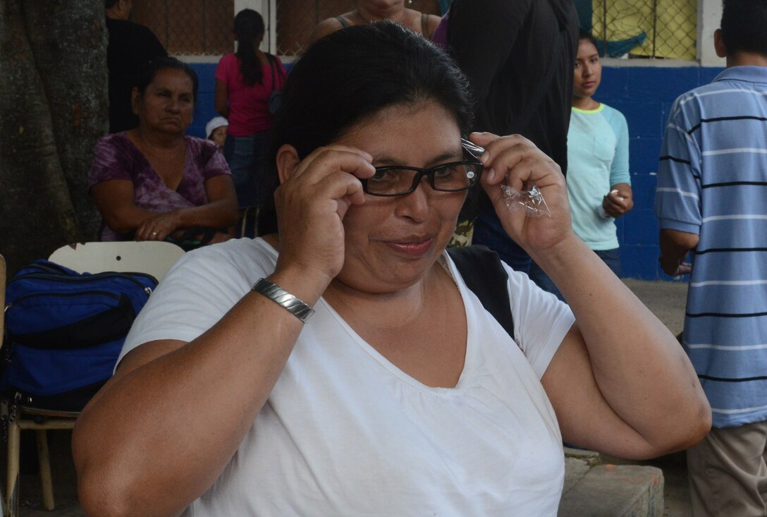 Reina Chavez, 43, has had great difficulty in reading. The strain on her eyes, she said, resulted in burning and itching. She was seen by optometry and received her first-ever pair of eyeglasses.