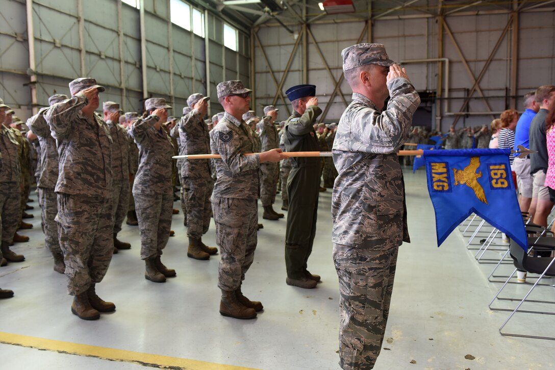 U.S. Airmen of the 169th Fighter Wing and the South Carolina Air National Guard, assemble for a change of command ceremony at McEntire Joint National Guard Base, S.C., June 23, 2018. Col. Nicholas Gentile Jr. relinquishes command of the 169th Fighter Wing to Col. Akshai Gandhi. (U.S. Air National Guard photo by Ashleigh Pavelek)