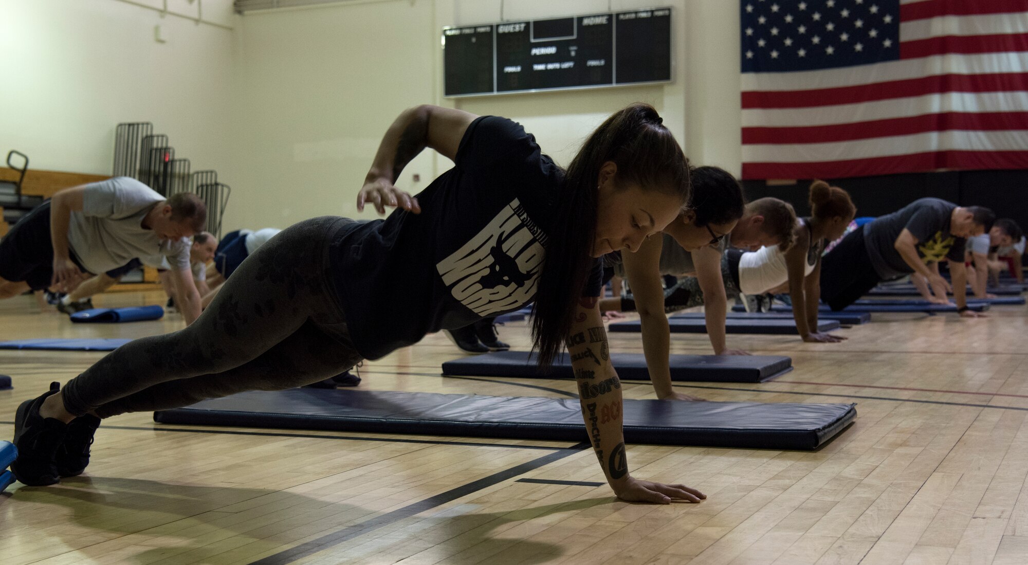 Joint Base McGuire-Dix-Lakehurst community members exercise during the Fit for the Fight professional development event at the McGuire Fitness Center on Joint Base MDL, N.J., June 27, 2018. The event was a two-day health and fitness demonstration showcasing how to maintain a healthy lifestyle with proper exercise, healthy eating and nutrition hosted by Elise "The Diva Chef" Harris, National Academy of Sports Medicine nutrition specialist. (U.S. Air Force photo by Airman Ariel Owings)