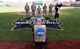 Airmen stand at home plate of TD Ameritrade Park for game one of the National Collegiate Athletic Association Men’s College World Series Omaha, Nebraska, June 26, 2018.