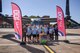 A Royal Air Force baton relay team from the 54th Signals Unit, RAF Digby, pose for a photograph during their visit to RAF Mildenhall, England, for the RAF 100 Baton Relay, June 29, 2018. The team is one of many who ran 54 kilometers at several bases during the relay. (U.S. Air Force photo by Senior Airman Christine Groening)