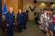 U.S. Air Force Lt. Gen. Mark Kelly, commander, 12th Air Force, U.S. Air Force Col. Brian Pukall, commander, 557th Weather Wing (WW), and U.S. Air Force Col. Steven Dickerson, outgoing commander, 557th WW, sing the Air Force song with audience members at the conclusion of the 557th WW change of command ceremony June 26, 2018, at Offutt Air Force Base, Nebraska. The 557th WW is the Air Force’s only weather wing.