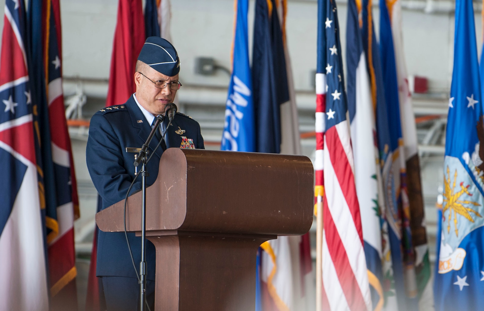 U.S. Air Force Lt. Gen. GI Tuck, 18th Air Force commander, delivers opening remarks during the 6th Air Mobility Wing change of command ceremony at MacDill Air Force Base, Fla., June 29, 2018.