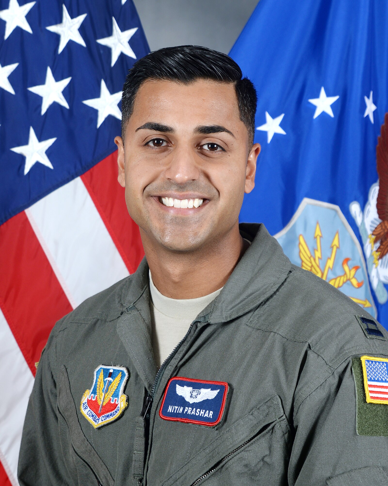 U.S. Air Force Captain Nitin Prashar, 38th Reconnaissance Squadron executive officer, poses for his official photograph August 16, 2017, at Offutt Air Force Base, Nebraska. Prashar created the Trail Blazer Scholarship which is offered to students who actively try to be a positive force for change in his home town of Rockford, Illinois, and in Omaha, Nebraska. (U.S. Air Force photo by D.P. Heard)