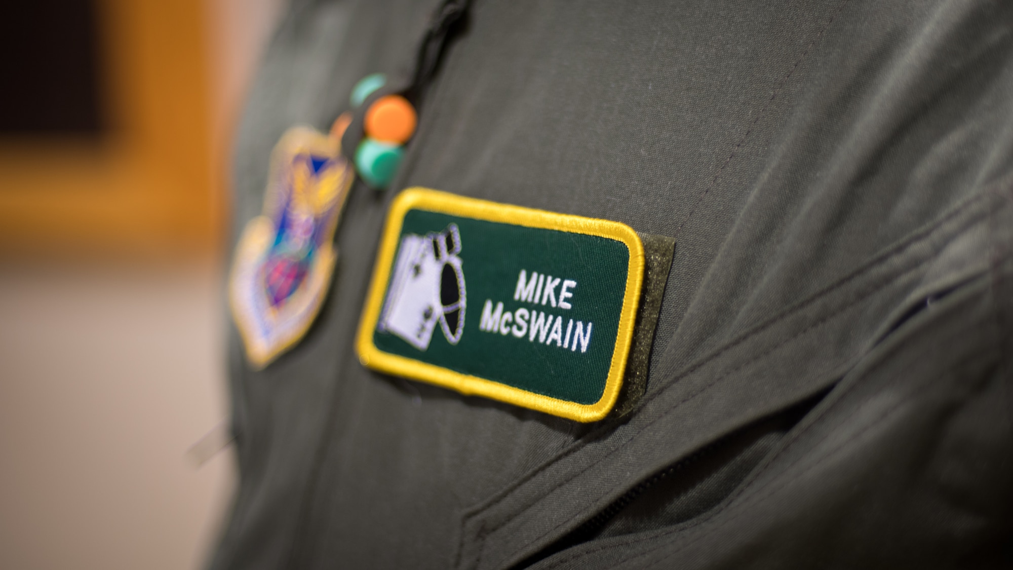 Mike McSwain, 2nd Operations Group honorary commander, displays his name patch before an honorary commander’s unit orientation flight at Barksdale Air Force Base, La., June 20, 2018. McSwain was appointed as the honorary commander to the 2nd OG in April 2018.