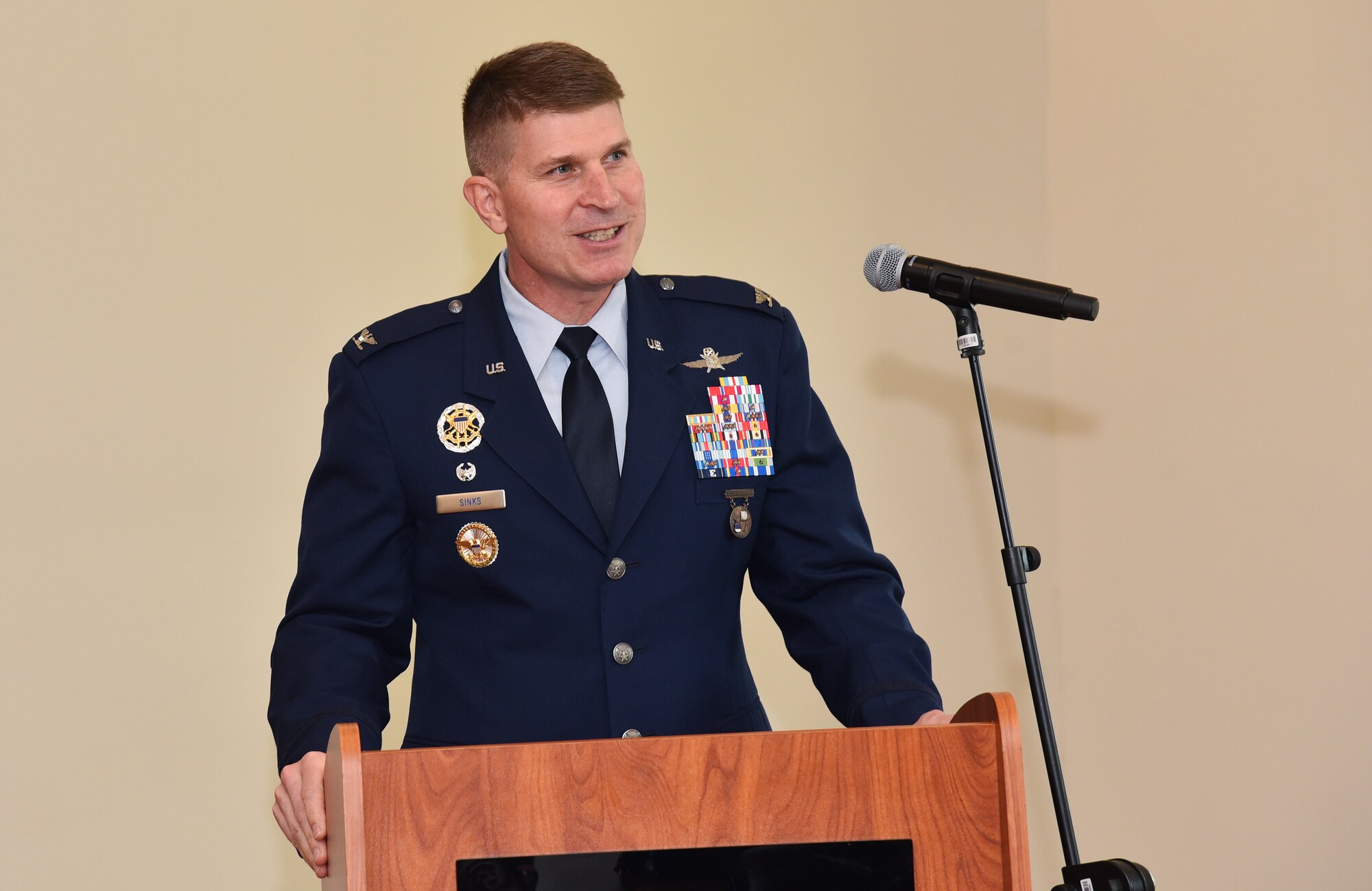 Col. Michael A. Sinks accepted command of the 844th Communications Group from Col. Rocky A. Favorito during a change-of-command ceremony June 28 on Joint Base Andrews, Maryland.