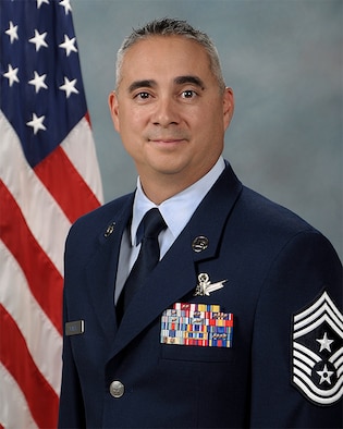 Biography photo for CMSgt Kahn Scalise, 302nd Airlift Wing command chief.