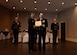 U.S. Navy Capt. Robert Hudson, right, is awarded the Legion of Merit in recognition for his accomplishments as Joint Base Charleston deputy commander and Naval Support Activity Charleston commander from U.S. Navy Capt. Kevin Byrne, Joint Base Charleston deputy commander ceremony June 29, 2018 at the Joint Base Charleston Weapons Station Red Bank Club.