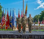 Lt. Gen. Jeffrey Buchanan (center), Maj. Gen. William Hall (left) and Maj. Gen. Richard Gallant (right) participate in the Joint Task Force Civil Support (JTF-CS) Change of Command ceremony on June 29 at Seay Plaza on Fort Eustis. During the ceremony, Hall assumed command of JTF-CS from Gallant and became the tenth commander of JTF-CS. JTF-CS provides command and control for designated Department of Defense specialized response forces to assist local, state, federal and tribal partners in saving lives, preventing further injury and providing critical support to enable community recovery. (Official DoD photo by Mass Communication Specialist 3rd Class Michael Redd/released)