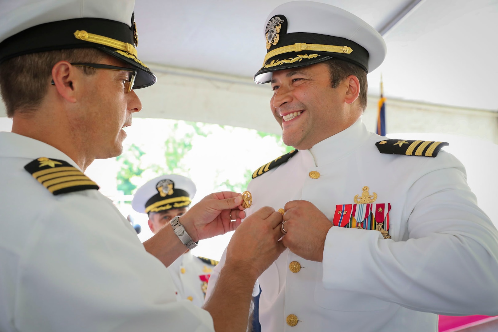 Cmdr. Matthew Myers, EXU-1’s inaugural commanding officer, receives his Command at Sea Insignia denoting his new status as a commanding officer.