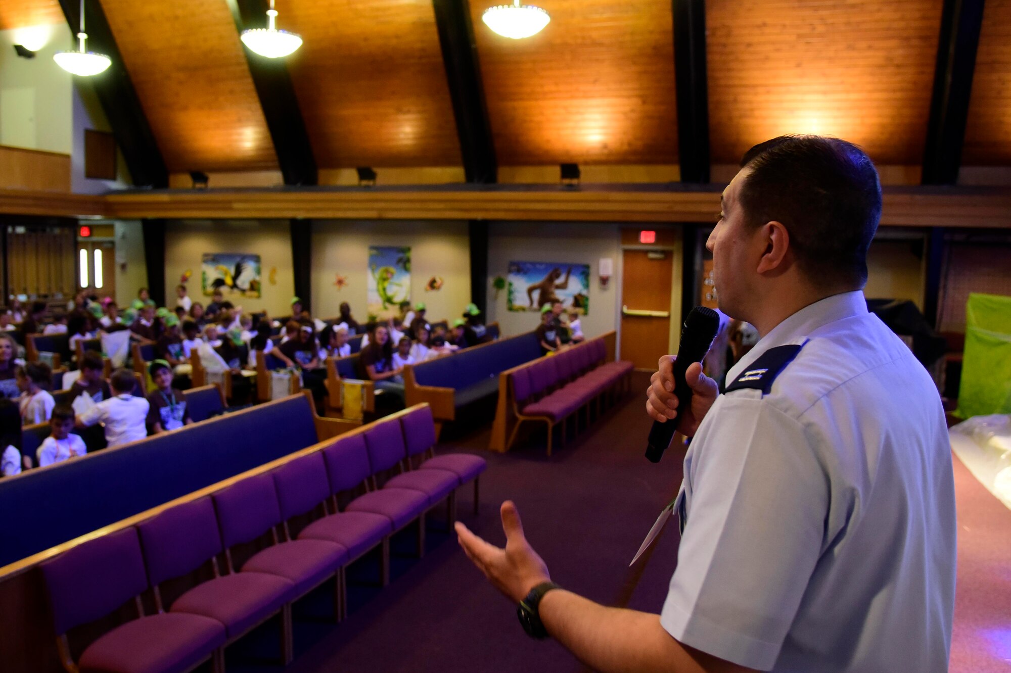 Capt. Juan Reyes, 92nd Air Refueling Wing chaplain, provides the closing prayer for Vacation Bible School June 29, 2018 at Fairchild Air Force Base, Washington. All of the activities that children participated in immersed them in faith development. These lessons are not limited to teaching bible verses and songs, they also give military children important tools to build upon their spiritual resilience in the face of the numerous challenges and stressors they encounter on an almost daily basis. (U.S. Air Force photo/Staff Sgt. Nick Daniello)