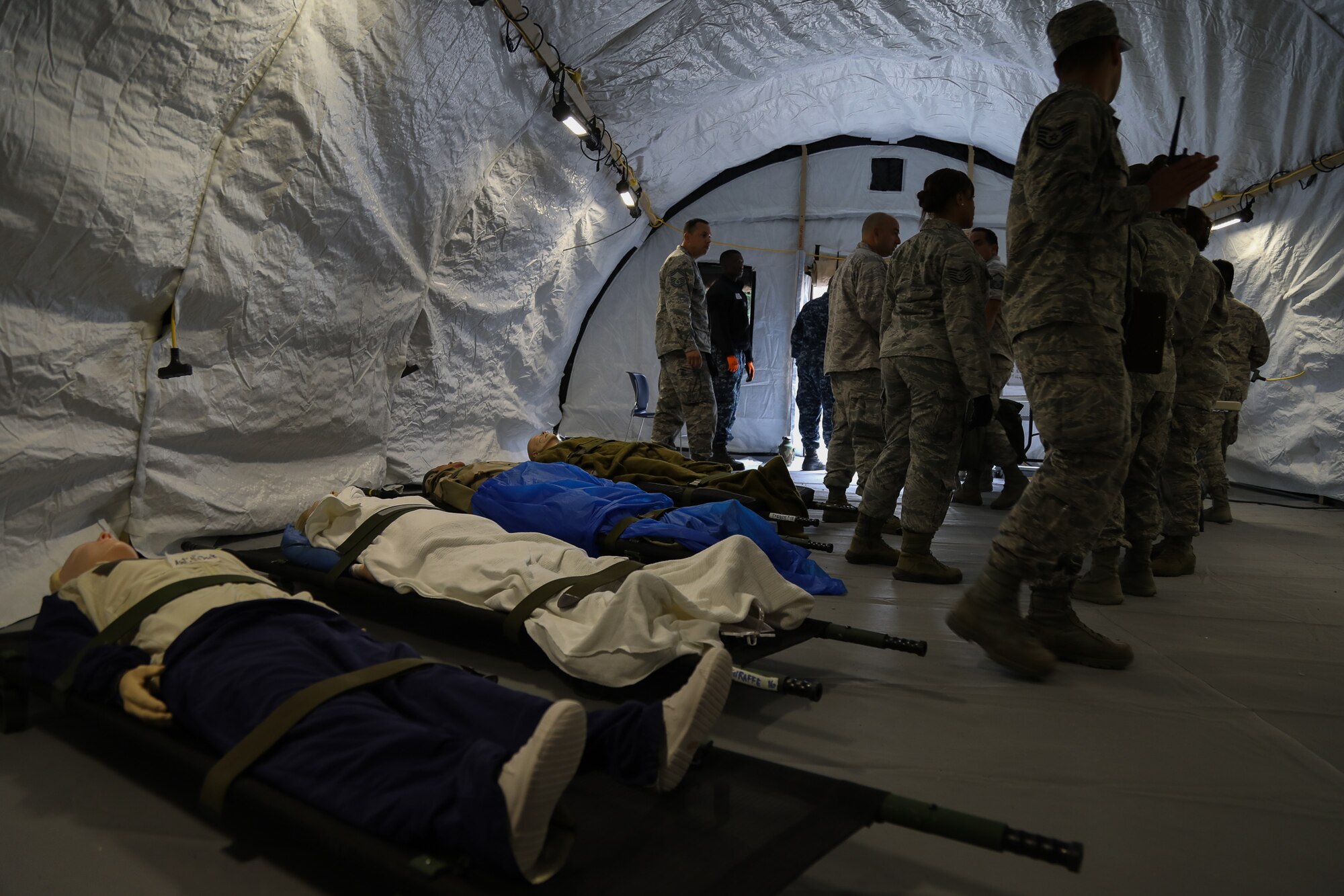 Simulated patients wait to be transported to Gray Field during Rainier Medic, where they will be loaded onto a running C-17 Globemaster III June 13, 2018, on Joint Base Lewis-McChord, Wash. The training was hosted by the Air Force Reserve, but had participants from multiple branches of service. (U.S. Air Force photo by David L. Yost)