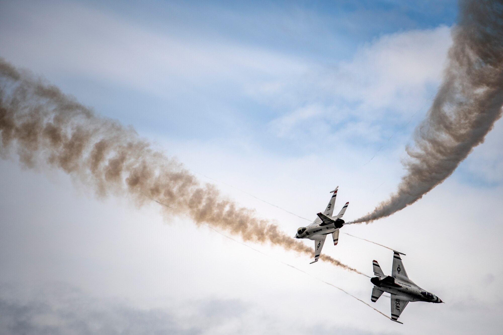 The U.S. Air Force Thunderbirds Demonstration Team   perform at the Arctic Thunder Open House Special Needs and Department of Defense Family Day at Joint Base Elmendorf-Richardson, Alaska, June 29, 2018. During the biennial open house, JBER opens its gates to the public and hosts multiple performers including the U.S. Air Force Thunderbirds, JBER Joint Forces Demonstration and the U.S. Air Force F-22 Raptor Demonstration Team.