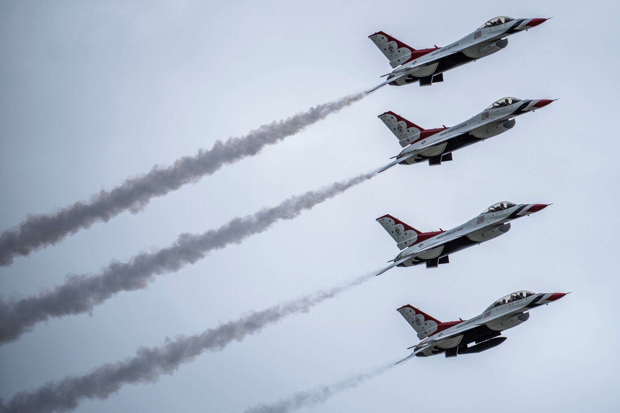 The U.S. Air Force Thunderbirds Demonstration Team perform at the Arctic Thunder Open House Special Needs and Department of Defense Family Day at Joint Base Elmendorf-Richardson, Alaska, June 29, 2018. During the biennial open house, JBER opens its gates to the public and hosts multiple performers including the U.S. Air Force Thunderbirds, JBER Joint Forces Demonstration and the U.S. Air Force F-22 Raptor Demonstration Team.