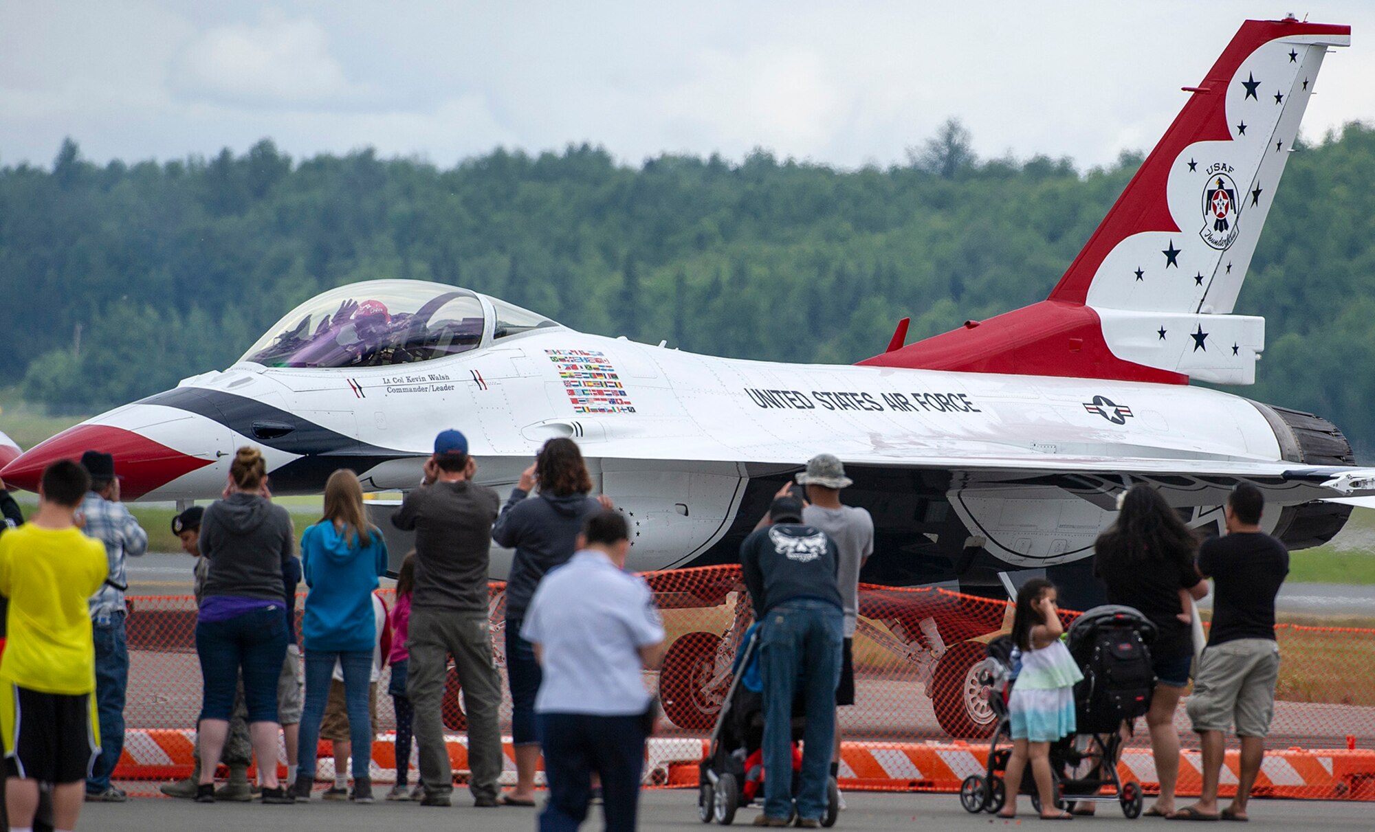 Air Force Lt. Col. Kevin Walsh, commander of the U.S. Air Force Thunderbirds Demonstration Team, waves to the crowd after performing during the Special Needs and Department of Defense Family Day at the Arctic Thunder Open House, June 29, 2018. This biennial event hosted by Joint Base Elmendorf-Richardson, Alaska, is one of the largest in the state and one of the premier aerial demonstrations in the world. The event features multiple performers and ground acts to include the JBER joint forces, U.S. Air Force F-22, and U.S. Air Force Thunderbirds demonstrations teams, June 30-July 1.