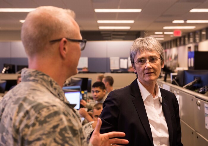 Maj. Gen. Chris Weggeman, Air Forces Cyber commander, explains the 624th Operations Center mission to Secretary of the Air Force Heather Wilson during her visit to Joint Base San Antonio-Lackland, Texas, June 28, 2018. During her visit, Wilson met Air Forces Cyber Airmen and learned about their contributions to the cyber mission. (U.S. Air Force photo by Tech. Sgt. R.J. Biermann)