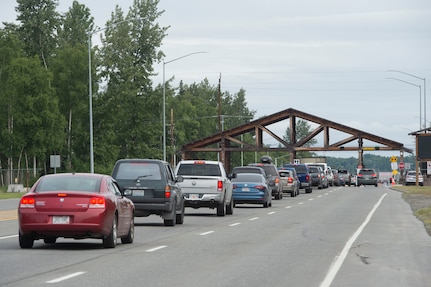 Visitors approach the Boniface entry gate to attend the Arctic Thunder Open House at Joint Base Elmendorf-Richardson, Alaska, June 30, 2018. This biennial event hosted by JBER is one of the largest in the state and one of the premier aerial demonstrations in the world. The event features multiple performers and ground acts to include the U.S. Air Force Thunderbirds, JBER Joint Forces Demonstration and the U.S. Air Force F-22 Raptor Demonstration Team. (U.S. Air Force photo by Alejandro Peña)