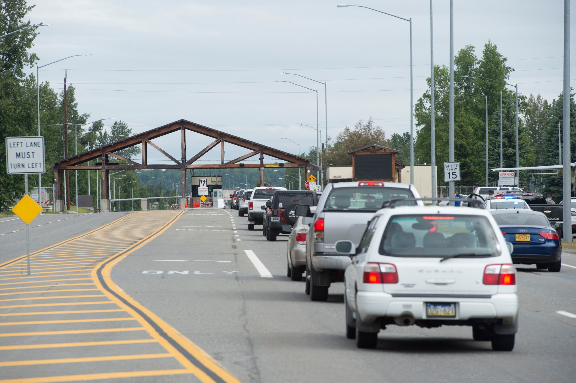 Visitors approach the Boniface entry gate to attend the Arctic Thunder Open House at Joint Base Elmendorf-Richardson, Alaska, June 30, 2018. This biennial event hosted by JBER is one of the largest in the state and one of the premier aerial demonstrations in the world. The event features multiple performers and ground acts to include the U.S. Air Force Thunderbirds, JBER Joint Forces Demonstration and the U.S. Air Force F-22 Raptor Demonstration Team. (U.S. Air Force photo by Alejandro Peña)
